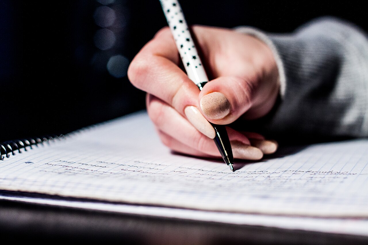 Pen writing notes studying